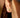 Close-up of a woman's ear showcasingWheatEmeraldAsymmetricEarrings