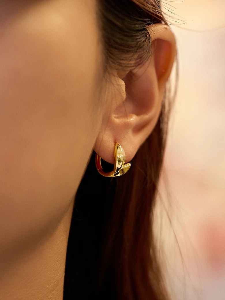 Close-up of a woman's neck showcasing WheatStudEarrings