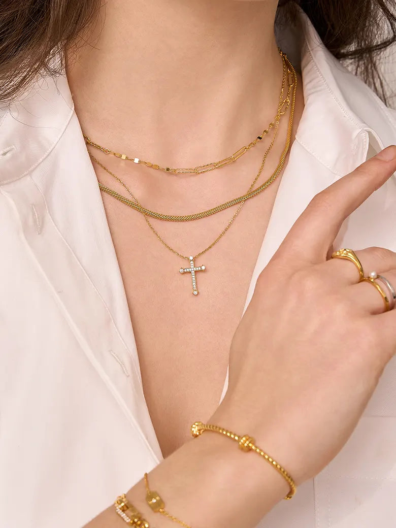 Close-up of a woman's neck showcasing WovenChainNecklace