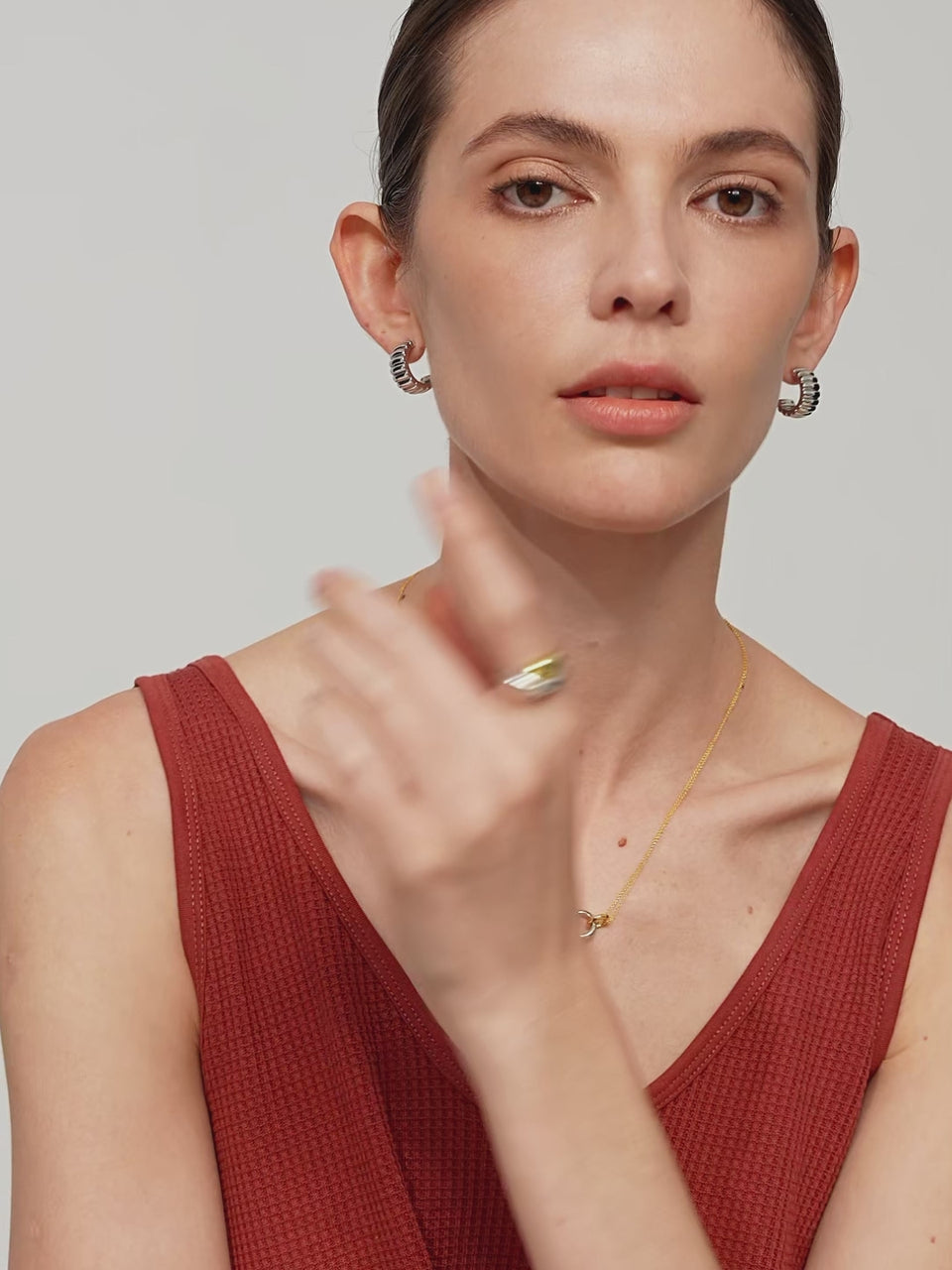 18k gold vermeil two-tone double-chain necklace with interlocking hoops.