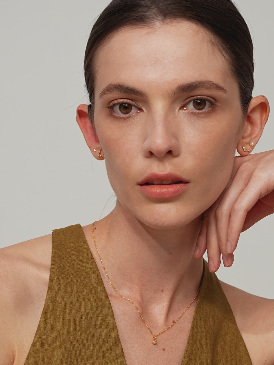 Bezel Solitaire Diamond Necklace featuring a gold chain and a lab-grown diamond pendant.