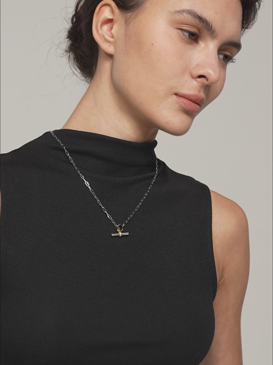 Sculptural Y lariat necklace with paperclip chain, polished ring connector and two-tone T-bar pendant